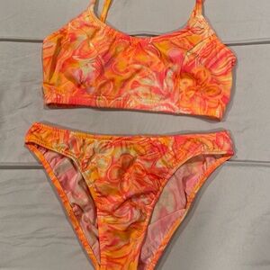 Women's swimsuit, bottoms are size m and top is size s.